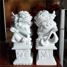 石雕狮子摆件 镇宅招财的风水智慧与艺术之美